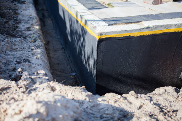 Professional Interior Drainage System technician working in Riverside, NY